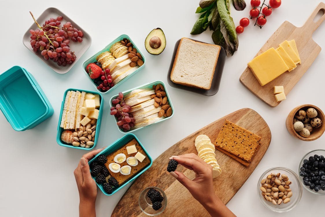 A variety of foods in meal prep containers — figuring out which ones work for you is the challenge