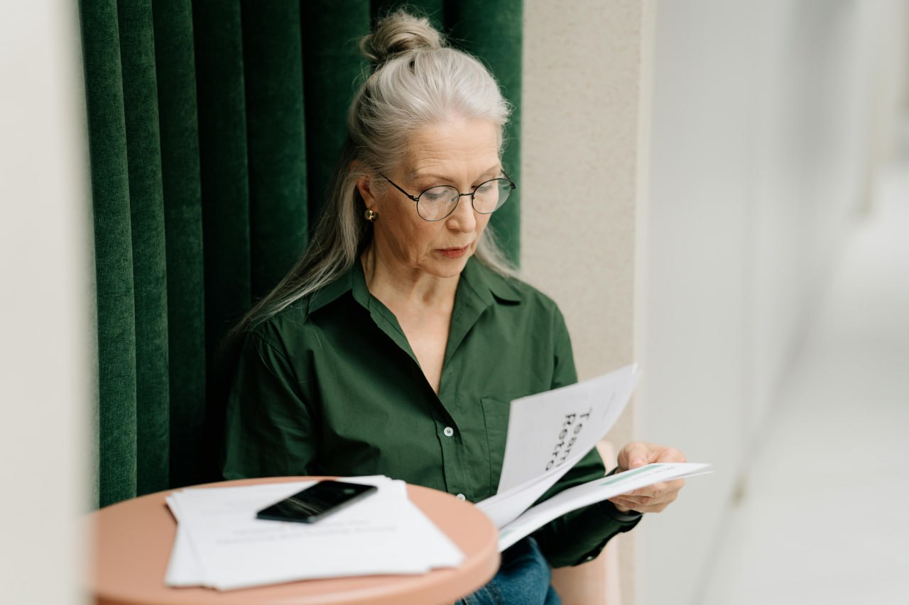 A person reviewing health documents and data insights